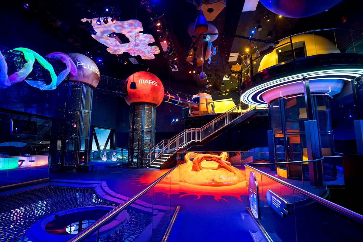 The second floor of Planet Play at Kennedy Space Center Visitor Complex includes the planets Mars, Merury and Pluto, along with the Sun.