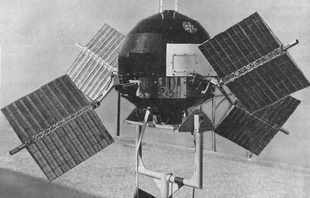 The Explorer 6 satellite with its paddles up.