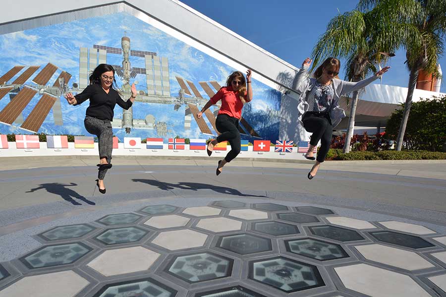 Guests jumping on the piezoelectric tile at Step. Power. Launch!