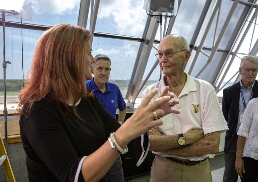 Artemis 1 Launch Director Charlie Blackwell-Thompson, left, talks to Apollo 11 astronaut Michael Collins.