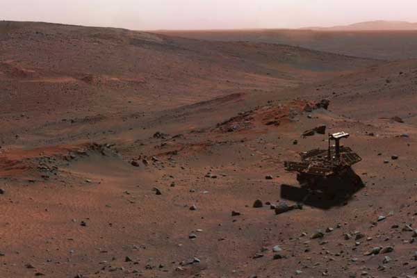 This synthetic image of NASA Spirit Mars Exploration Rover on the flank of Husband Hill was produced using Virtual Presence in Space technology.