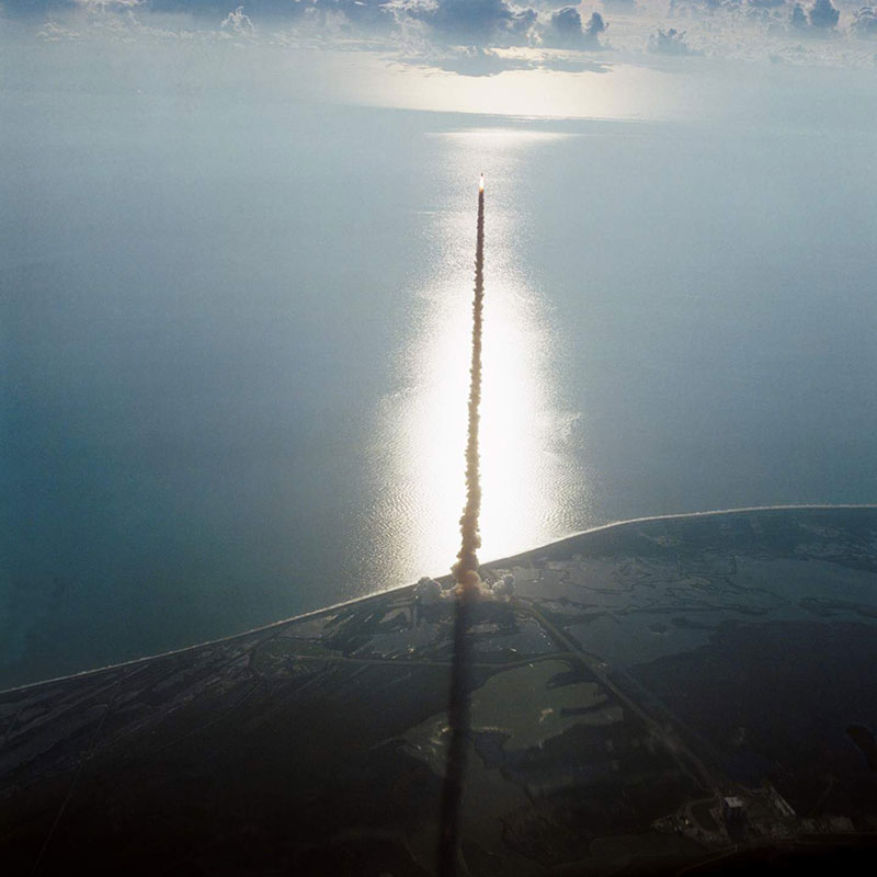 Space shuttle Discovery on August 30, 1984 launching through Kennedy Space Center airspace on its maiden voyage. 